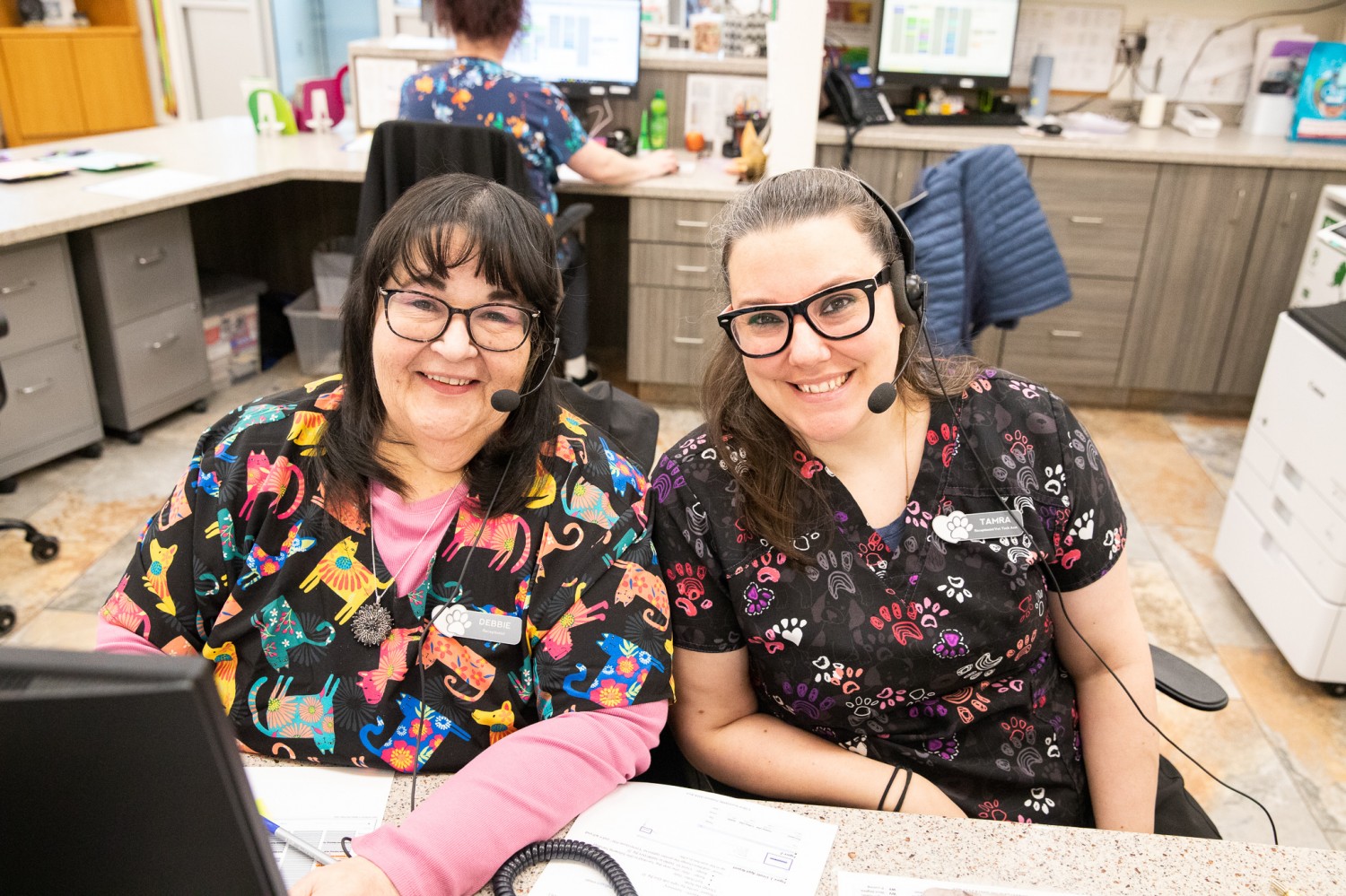 Two of our staff members ready to greet our clients